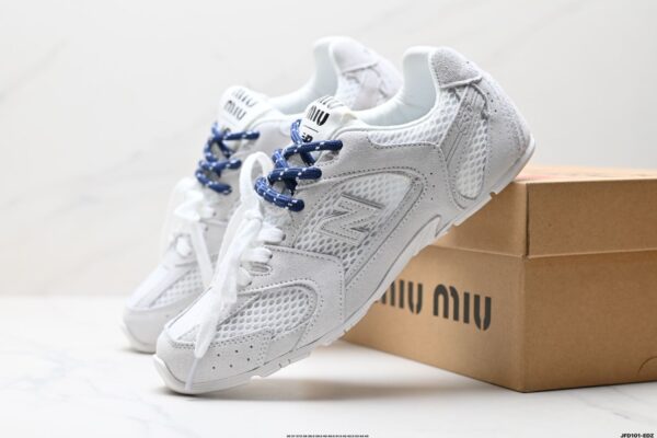 Tênis New Balance X Miu Miu 530 SL em couro metálico e malha - Image 9
