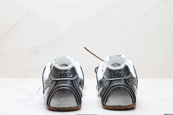 Tênis New Balance X Miu Miu 530 SL em couro metálico e malha - Image 8